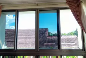 Dán phim cách nhiệt cửa kính